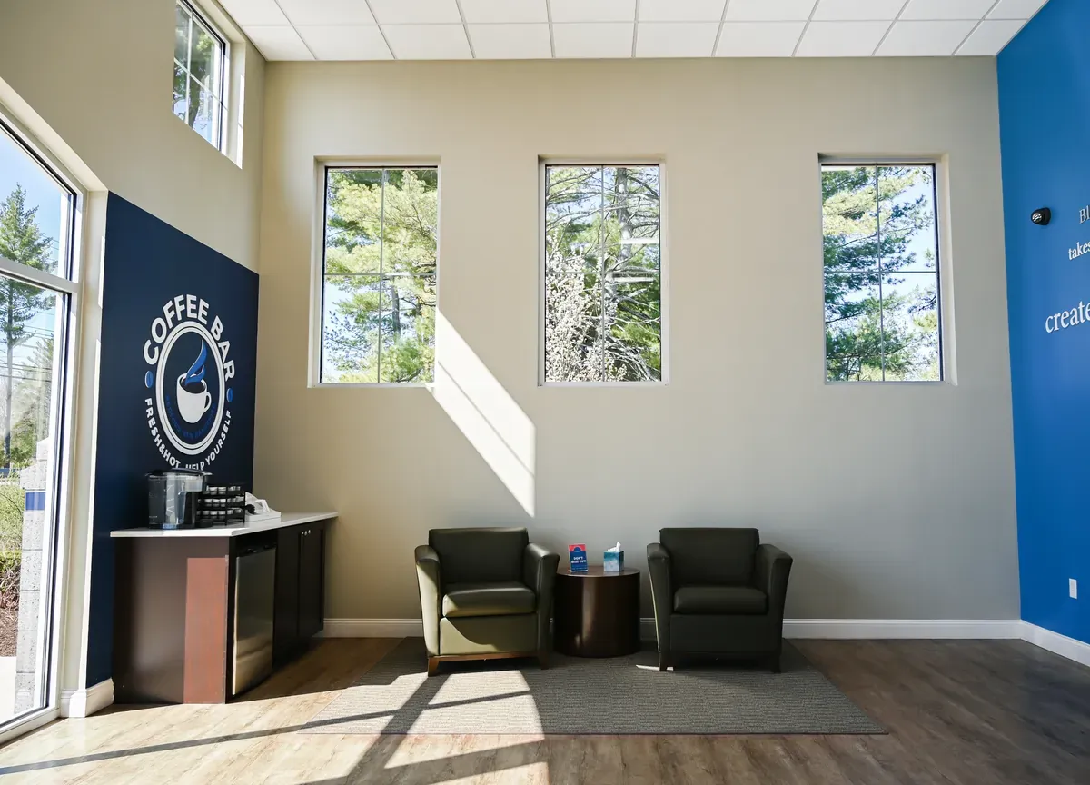 Bluebird Self Storage lobby with complimentary coffee bar and leather seating