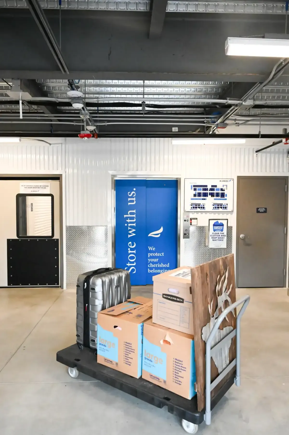 Moving cart with boxes near facility elevator