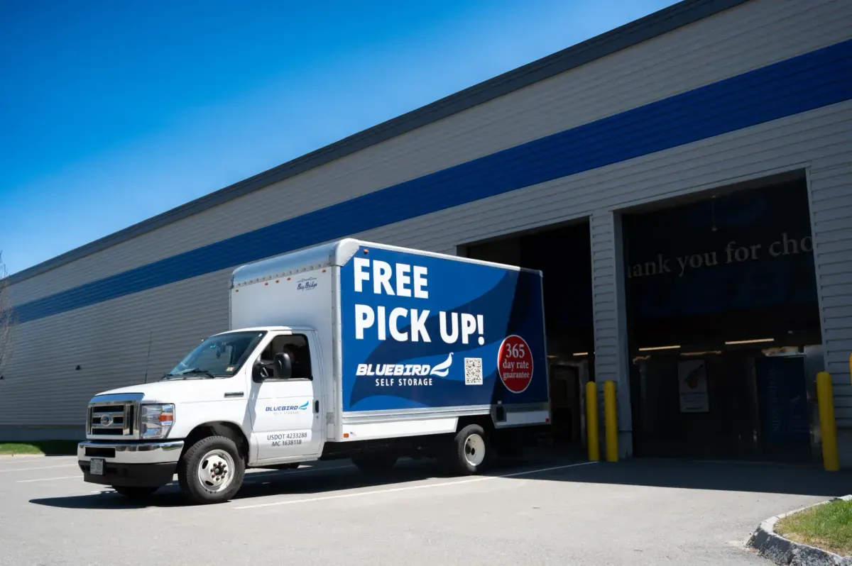 Bluebird free pick-up truck outside facility