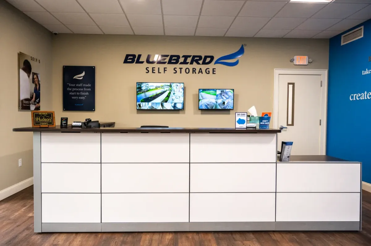 Bluebird Self Storage front desk with security monitors