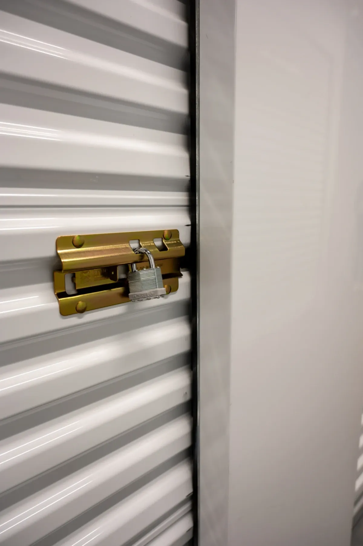 Padlock securing a storage unit door