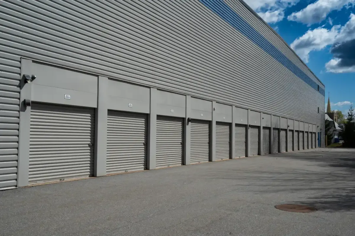 Row of outdoor drive-up storage unit doors